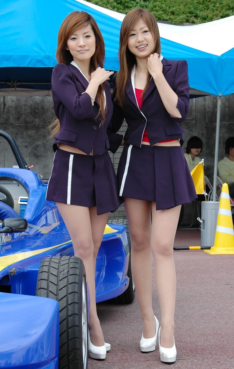 Two Auburn Race Queens wearing White Sheer Pantyhose and White Stilettos